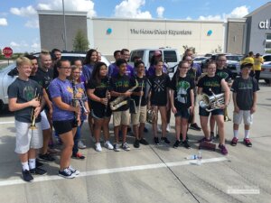 Members of the TSMS, TCHS, and TVMS bands meet before the Sunshine Spaces reveal. (Photo from The Creek Yearbook.)
